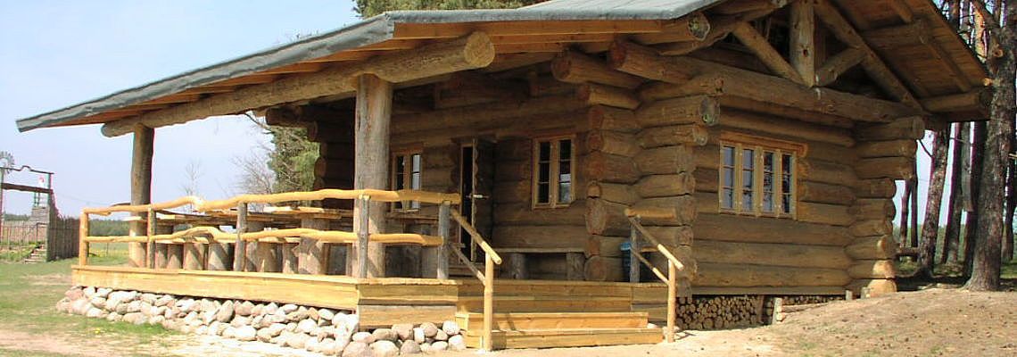 Naturstamm Blockhaus Weekender III als Saloon