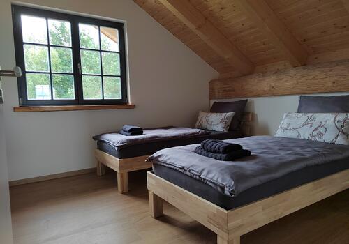 Post & Beam Blockhaus Blackfoot_Schlafzimmer 1